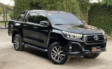 Selling Black Toyota Hilux 2020 in Quezon