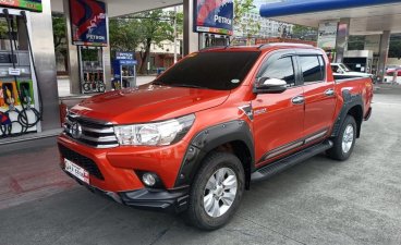 Selling Orange Toyota Hilux 2019 in Manila