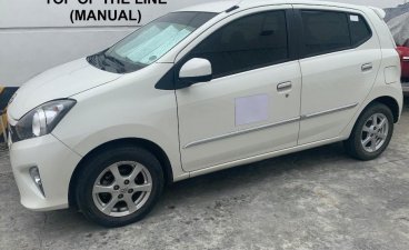 Selling White Toyota Wigo 2017 in Makati
