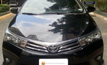 Selling Black Toyota Corolla Altis 2016 in San Juan