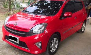 Red Toyota Wigo 2016 for sale in Cabanatuan