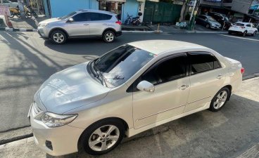 Selling Pearl White Toyota Corolla Altis 2013 in Pasay