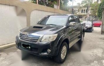 Black Toyota Hilux 2013 for sale in Quezon