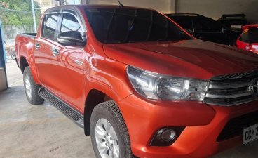 Selling Orange Toyota Hilux 2016 in Pasig