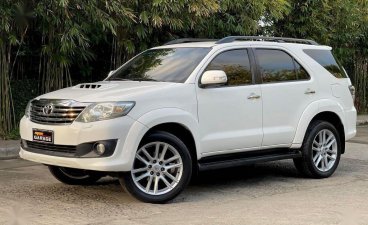 Pearl White Toyota Fortuner 2013 for sale in Quezon City
