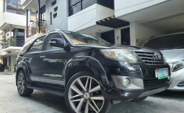 Black Toyota Fortuner 2013 for sale in Quezon City