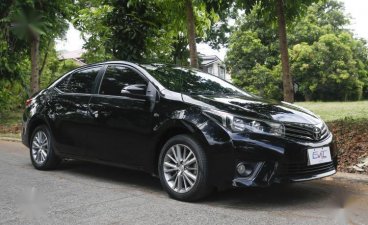 Selling Black Toyota Corolla altis 2014 in Quezon City