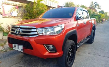 Orange Toyota Hilux 2017 for sale in Angeles 