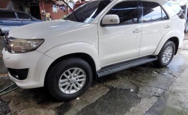 Selling White Toyota Fortuner 2012 in Quezon City