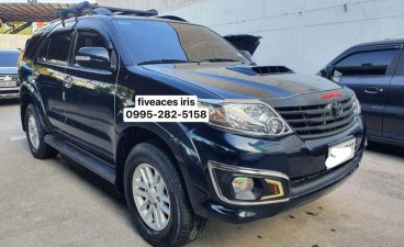 Purple Toyota Fortuner 2014 for sale in Manual