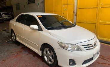 Sell Pearl White 2013 Toyota Corolla in Quezon City