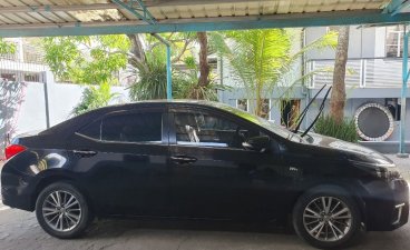 Sell White 2014 Toyota Corolla altis in Nampicuan