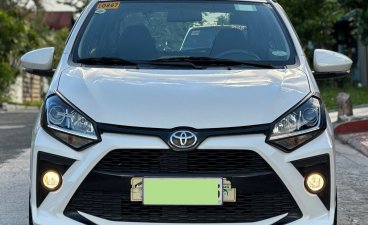 Selling White Toyota Wigo 2021 in Quezon City