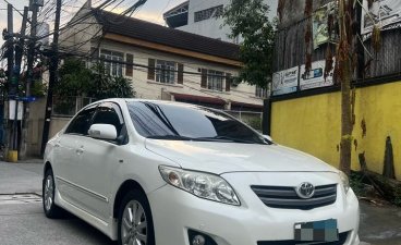 Selling Pearl White Toyota Altis 2010 in Pasig
