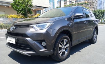 Selling White Toyota Rav4 2018 in Pasig