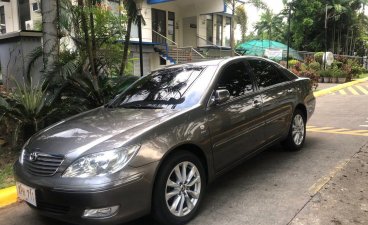 Selling White Toyota Camry 2004 in Quezon City