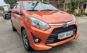 Orange Toyota Wigo 2018 Hatchback at 43000 for sale in Manila