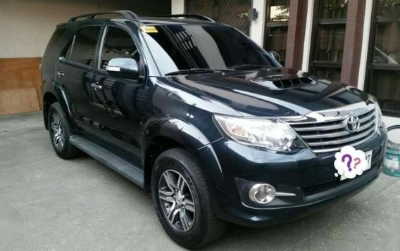 TOYOTA Fortuner G AT 2015 model smells new good as new