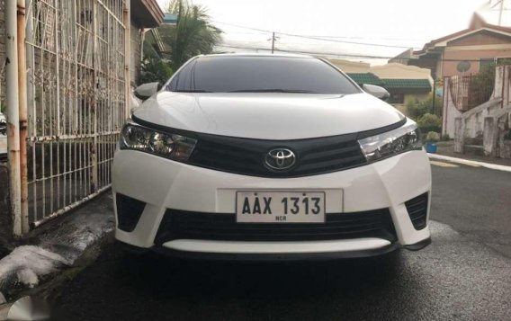 Selling Toyota Altis 1.6E 2015-8