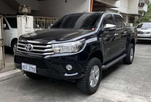 Selling Toyota hilux 4x2 G Automatic diesel Black 2016