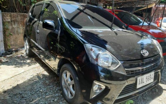 Selling Black 2014 Toyota Wigo in Marikina