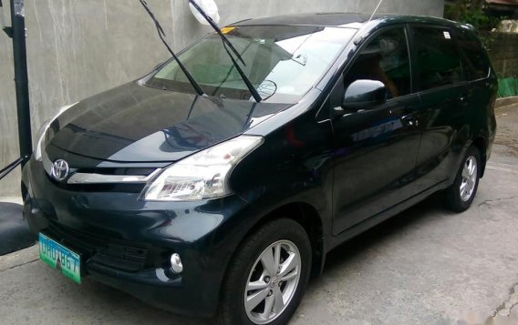 Selling Black Toyota Avanza 2013 Van at Automatic Gasoline 