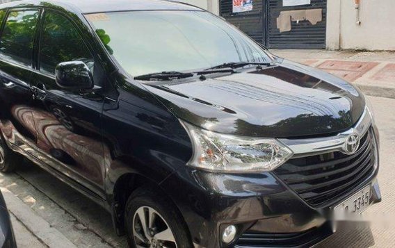 Selling Black Toyota Avanza 2018 Automatic Gasoline for sale in Quezon City