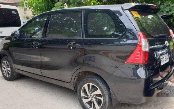 Selling Black Toyota Avanza 2018 Automatic Gasoline for sale in Quezon City-2