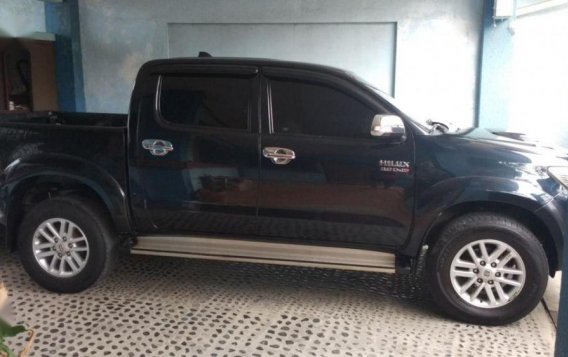 Selling Black Toyota Hilux 2012 for sale in Manual-2