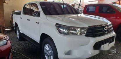 Selling White Toyota Hilux 2016 at 8800 km in Quezon City