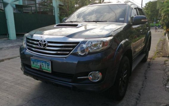 Selling Black Toyota Fortuner 2014 Automatic Diesel in Las Piñas