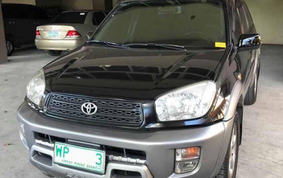 Selling Black Toyota Rav4 2000 in Quezon City-1