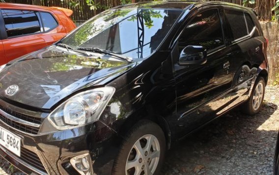 Selling Black Toyota Wigo 2014 Automatic Gasoline at 20000 km in Quezon City-3