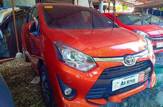 Orange Toyota Wigo 2019 for sale in Quezon City 