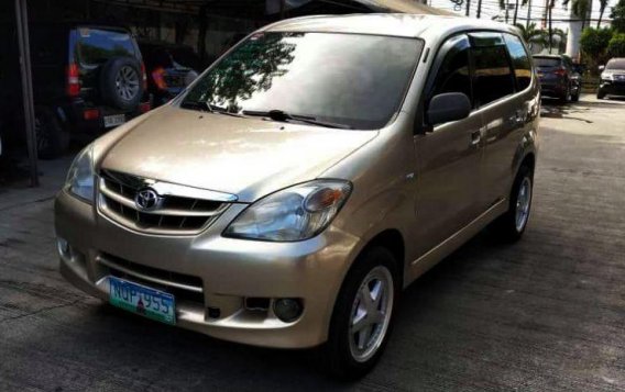 Selling Gold Toyota Avanza 2009 at 89,882 km in Cainta-1