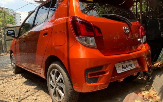 Selling Orange Toyota Wigo 2019 Hatchback Manual Gasoline in Quezon City-1