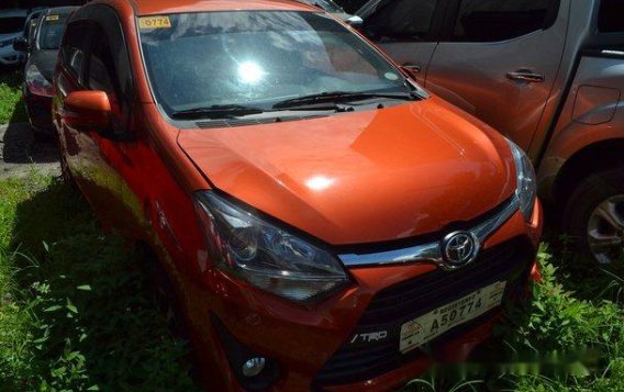 Orange Toyota Wigo 2018 for sale in Quezon City 