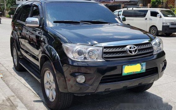 Black Toyota Fortuner 2011 Automatic Gasoline for sale in Quezon City