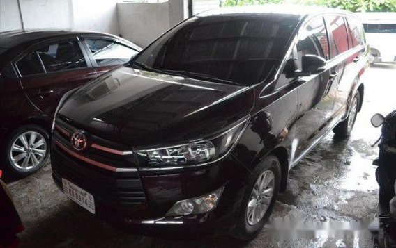Selling Red Toyota Innova 2017 at 7700 km 
