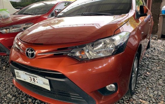 Selling Orange Toyota Vios 2015 Sedan at Automatic Gasoline in Quezon City