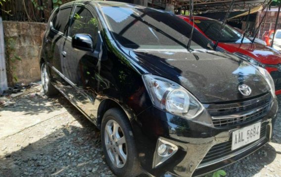 Sell Black 2014 Toyota Wigo in Quezon City