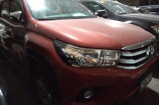 Selling Orange Toyota Hilux 2017 in Makati -1
