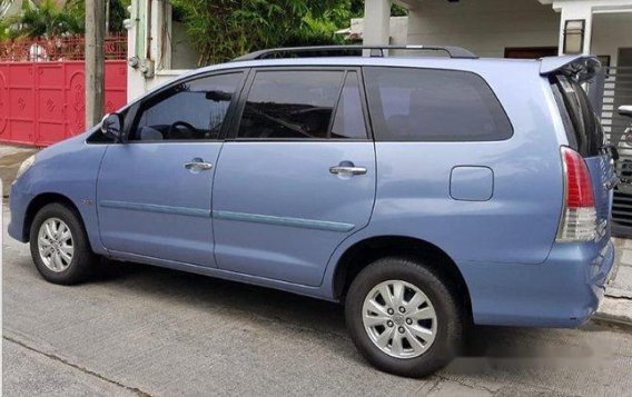 Blue Toyota Innova 2012 at 110000 km for sale -2