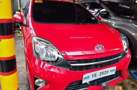 Red Toyota Wigo 2016 for sale in Quezon City