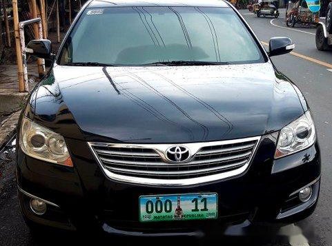 Selling Black Toyota Camry 2007 at 150000 km 