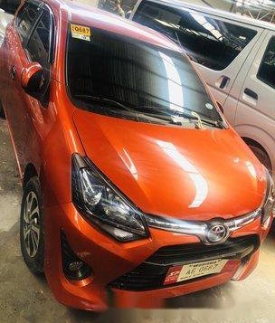 Orange Toyota Wigo 2018 for sale in Quezon City 