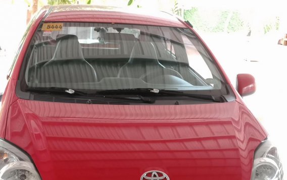 Red Toyota Wigo 2015 Hatchback for sale in Batangas