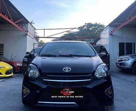 Selling Black Toyota Wigo 2014 at 25000 km