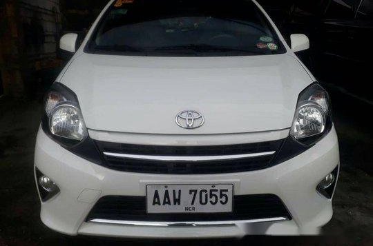 Selling White Toyota Wigo 2014 Automatic Gasoline at 33919 km