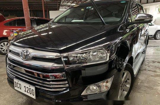 Selling Black Toyota Innova 2016 at 18000 km